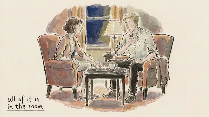 A man flinching as a tarot card is turned over, the reader noticing the flinch instead of the card